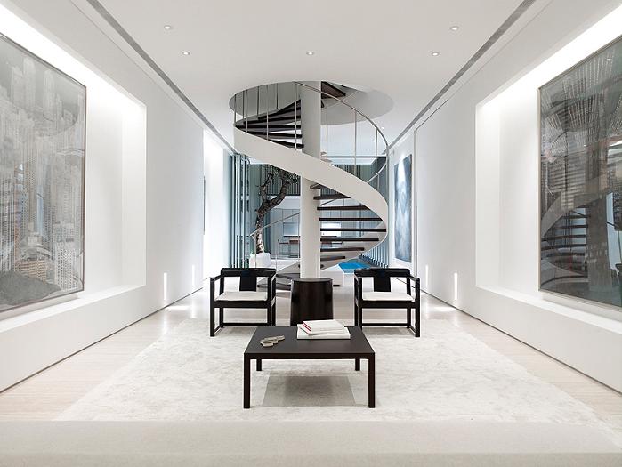 beautiful wide spiral staircase An Elegant Solution To A Long And Narrow Space