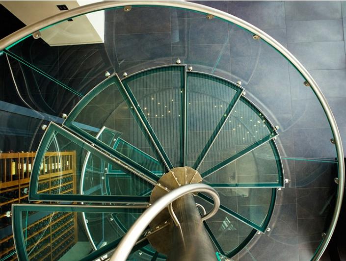 glass spiral staircase from above The $10 Million Aquarius Penthouse Feels Like a Nightclub