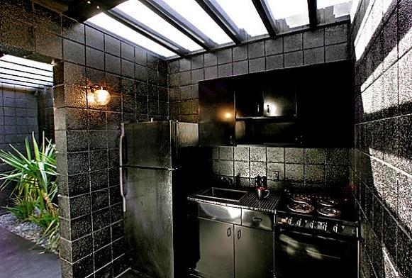 all black kitchen interior design inspiration What Happens When a Punk Rocker Designs a Desert Home?