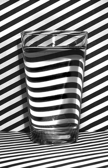glass of water on black and white striped background Picture of the Day   March 16, 2010
