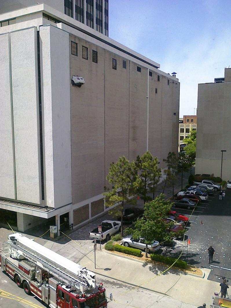 car reverses through wall of building fail Picture of the Day   April 29, 2010