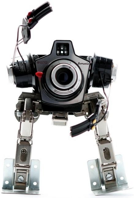 robotic sculpture made from camera Incredible Robot Sculptures Made from Old Electronic Parts
