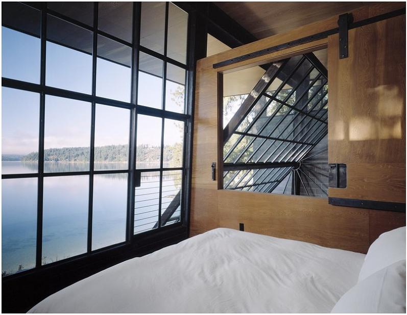 incredible view of lake from cabin Industrial Chic   Modern Cabin with Giant Window for a Wall