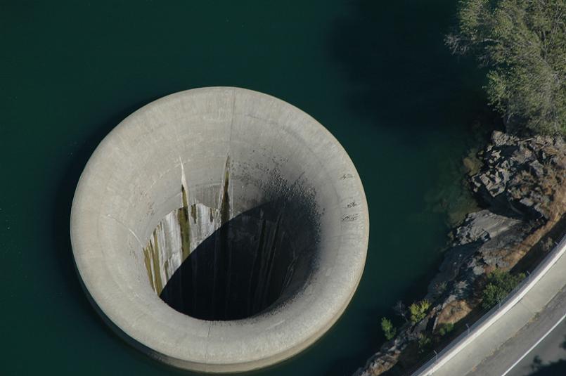 massive hole in the water Bell Mouth Spillways: How Giant Holes in the Water are Possible