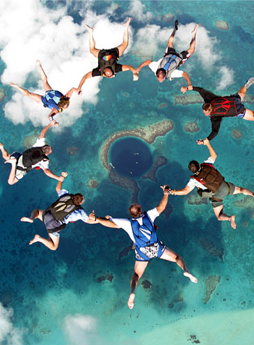 sky diving over the giant blue hole belize aerial The Great Blue Hole in Belize
