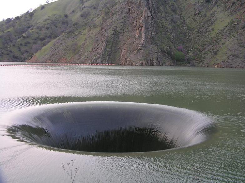 vortex in the water monticello dam Bell Mouth Spillways: How Giant Holes in the Water are Possible