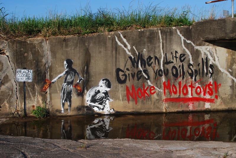 when live gives you oil spills make molotovs graffiti street art Picture of the Day   May 16, 2010
