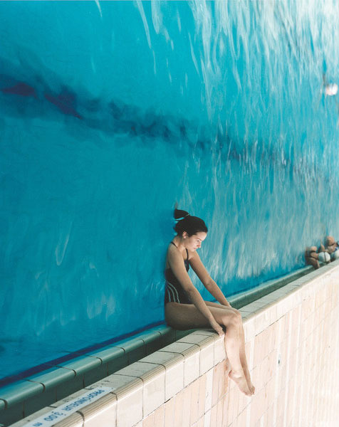 woman sinking into wall of water 90 degrees Picture of the Day   Tilt Head Right