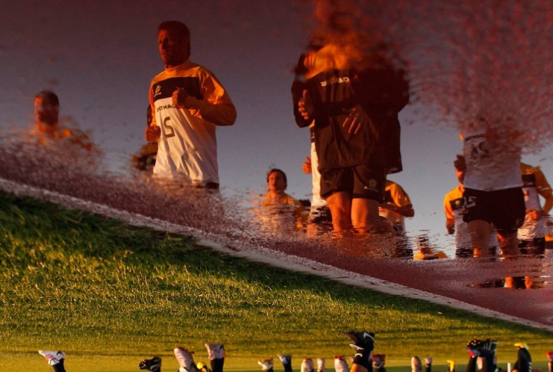 lucas neil reflected in water australia soccer football team Picture of the Day   June 10, 2010