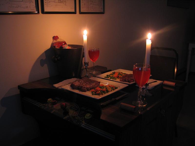 romantic candelight dinner on pacman table roll of quarters Picture of the Day   August 14, 2010