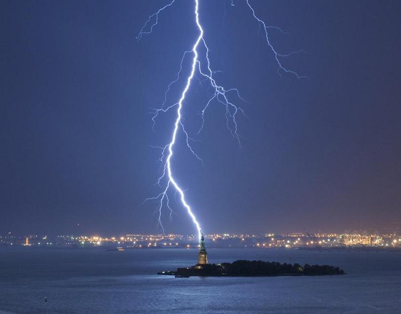 lightning bolt strikes statue of liberty Natures Fury: 30 Chilling Photos of Natural Hazards