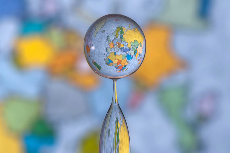 map of earth refelcted in drop of water Picture of the Day: Little Big Planet