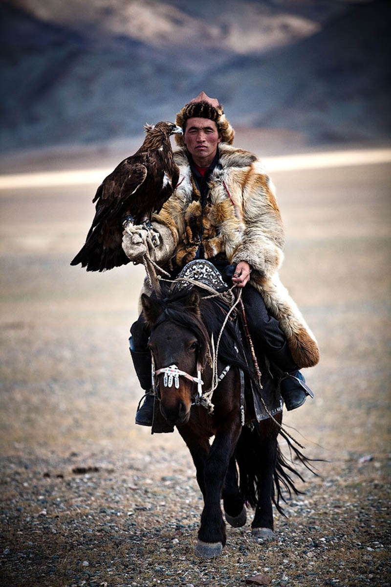 mongolian hunter with eagle riding horse The Top 50 Pictures of the Day for 2011