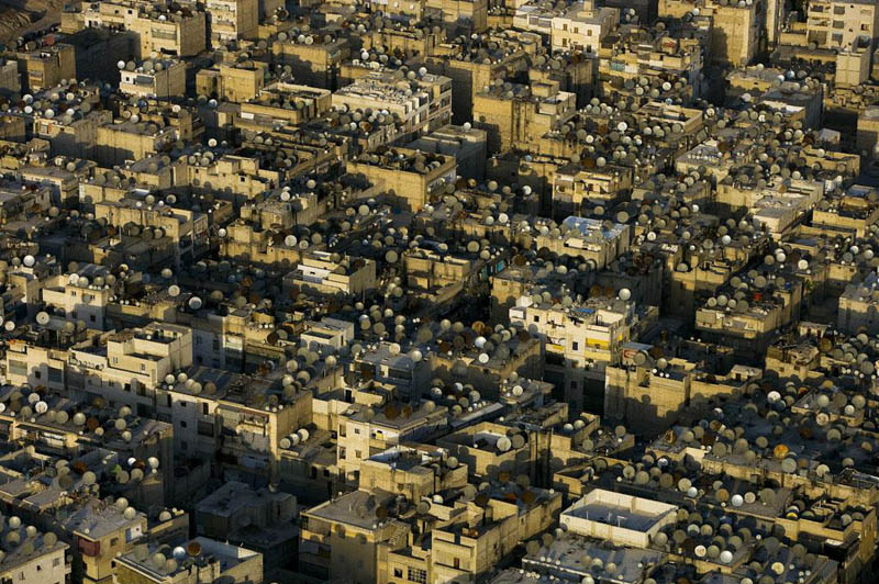 satellite dishes on the roofs of aleppo syria 25 Mind Blowing Aerial Photographs Around the World