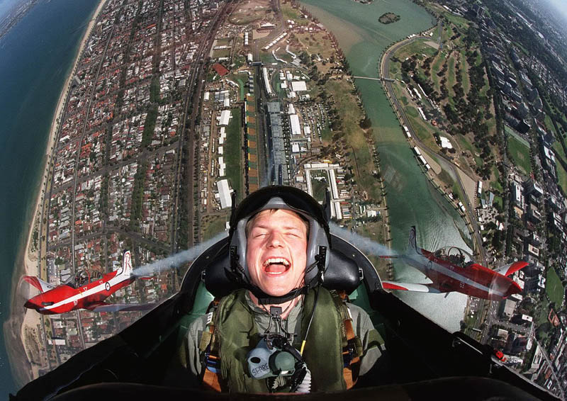 kimi raikkonen flying in plane over australian grand prix albert park The Top 50 Pictures of the Day for 2011