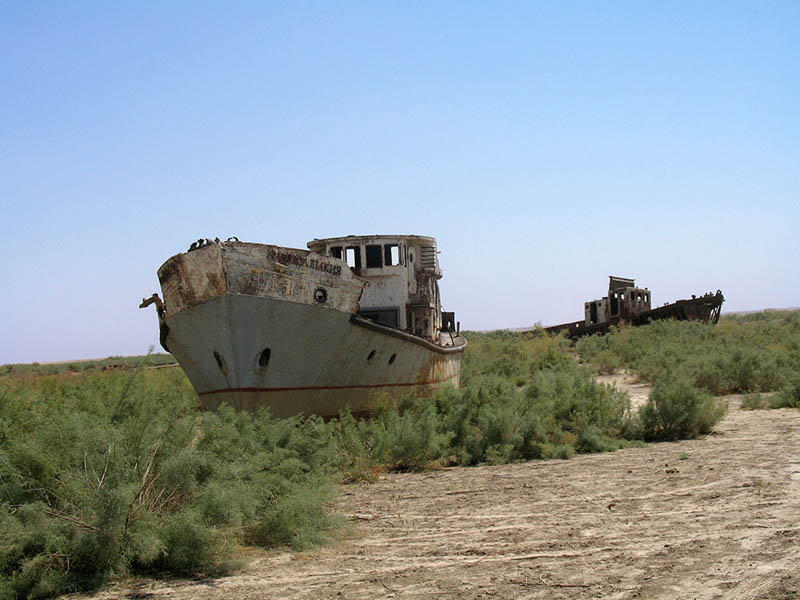 orphaned ships in the former aral sea harbor of moe28098ynoq uzbekistan 25 Haunting Shipwrecks Around the World