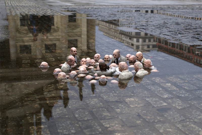 cement miniature sculptures artist isaac cordal 25 Miniature World Photo Manipulations by 14 year old Phenom