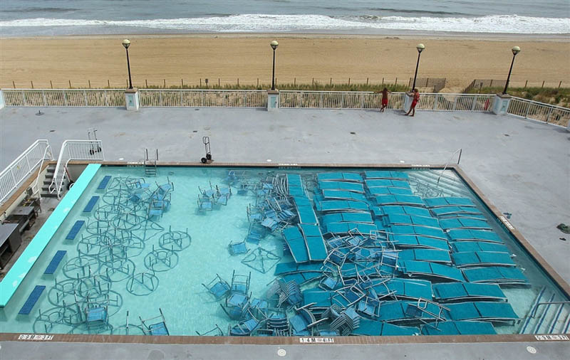 pool furniture at bottom of pool hurricane preparation Picture of the Day: Hurricane Irene Pool Preparations