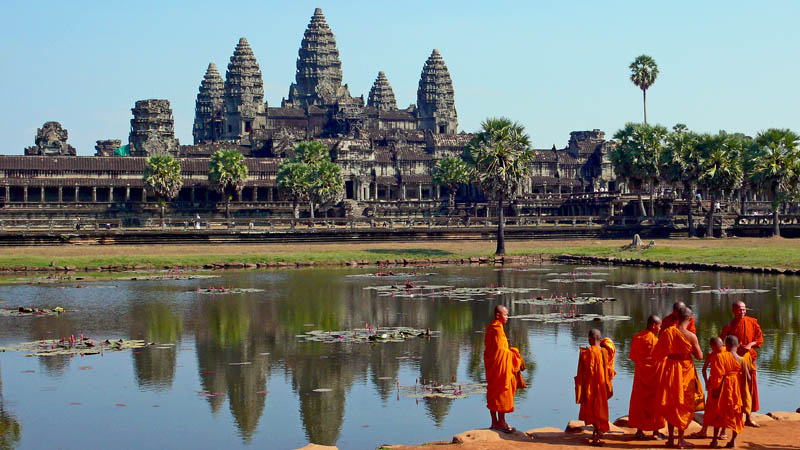 buddhist monks in front of the angkor wat This Day In History   November 9th