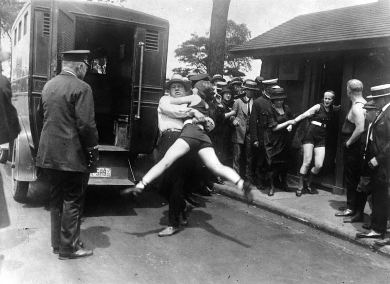 women being arrested for not wearing leg coverings on bathing suit 1922 chicago Picture of the Day: Bathing Suit Rebellion, Chicago 1922