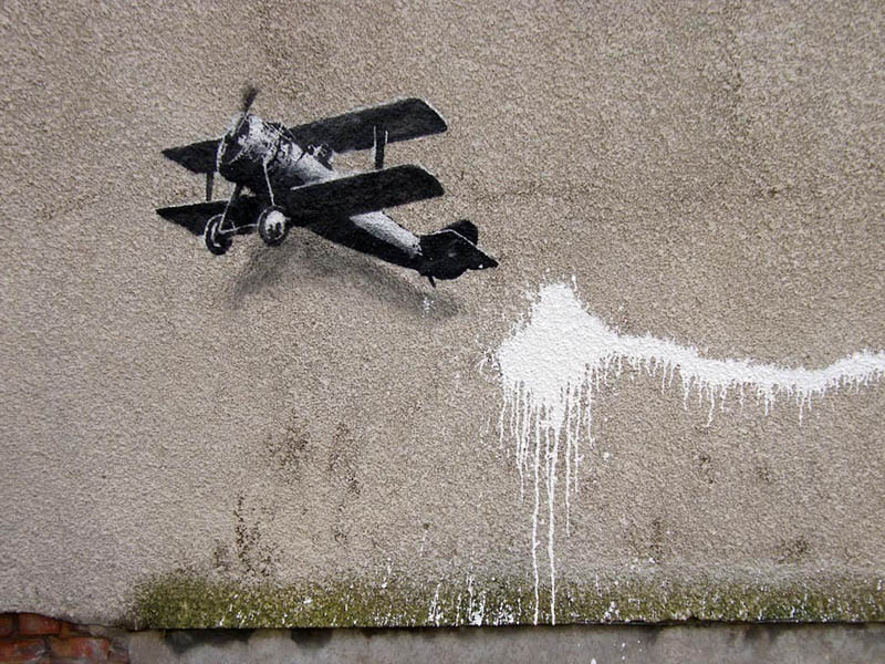 banksy plane stencil street art 1 Banksy Goes on a Holiday Tear [9 pics]