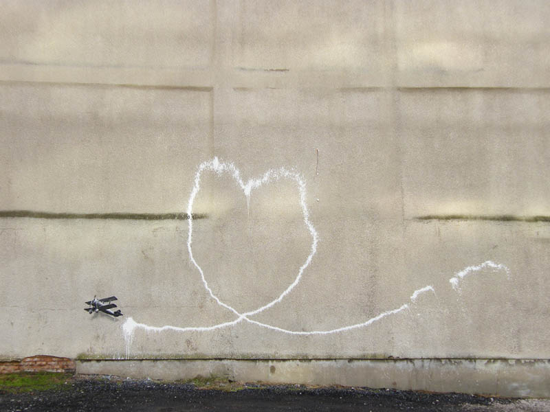 banksy plane stencil street art 2 Banksy Goes on a Holiday Tear [9 pics]