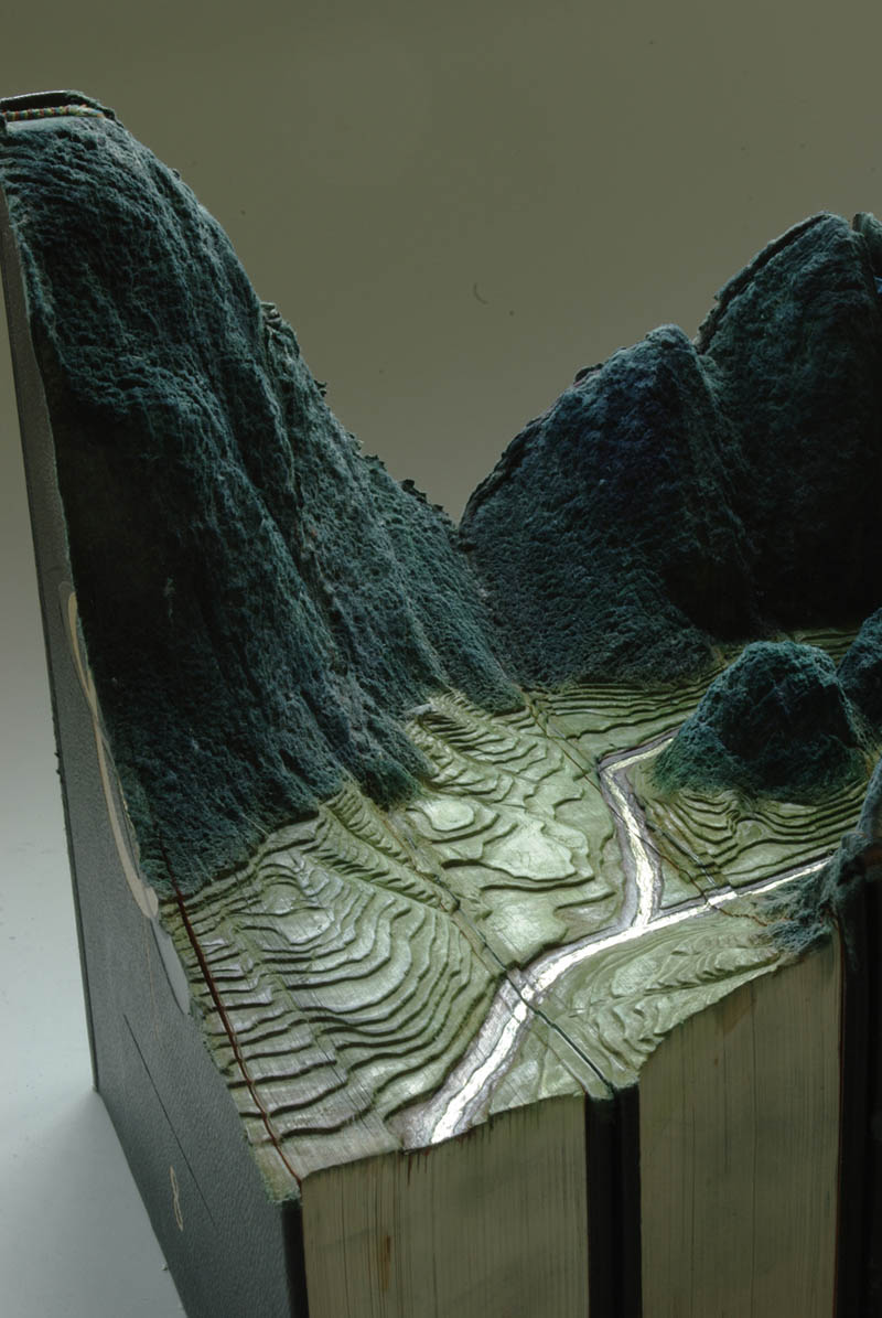 landscapes carved into books guy laramee 8 Incredible Landscapes Carved Into Books