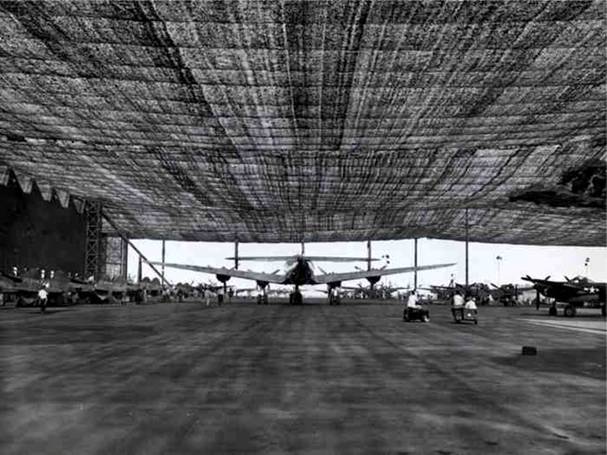 wwii lockheed covered in netting 4 Hiding Air Bases, Factories and Plants in WWII