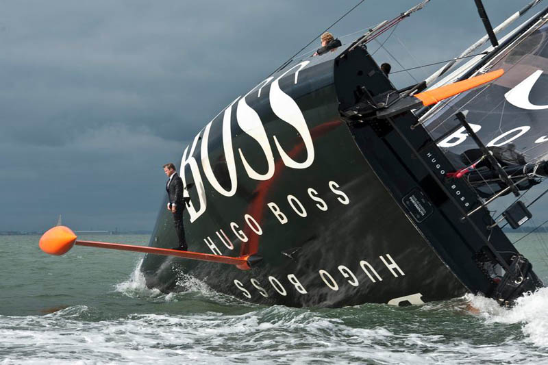 keel walk hugo boss suit boat sailing standing on rutter Standing on the Bulbous Bow of the Worlds Largest Ocean Liner