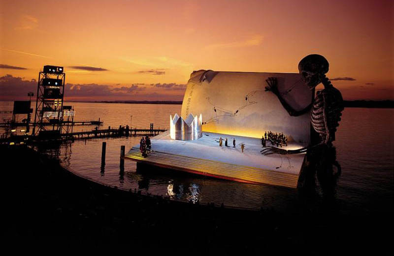 bregenz opera on the lake a masked ball giuseppe verdi giant skeleton book stage Stadium in Berlin Gets Turned Into Giant Living Room with 750 Couches and 700 TV