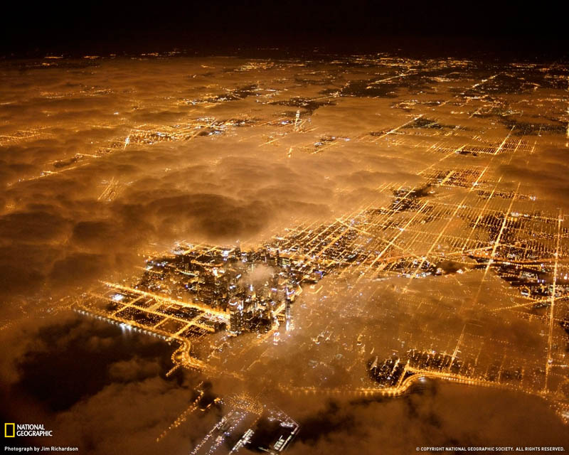 chicago lights at night aerial above the clouds Picture of the Day: Chicago City Lights at Night