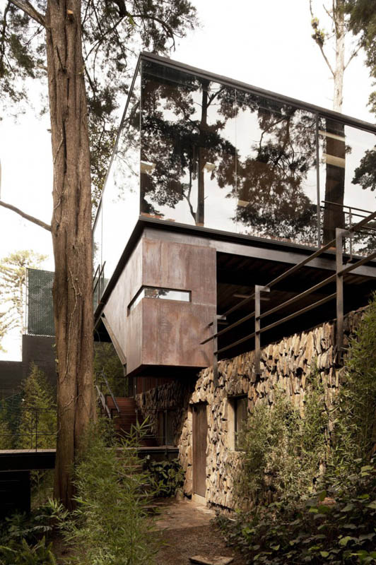 house in forest with trees growing through it 22 An Incredible Home in the Forest With Trees Growing Through It