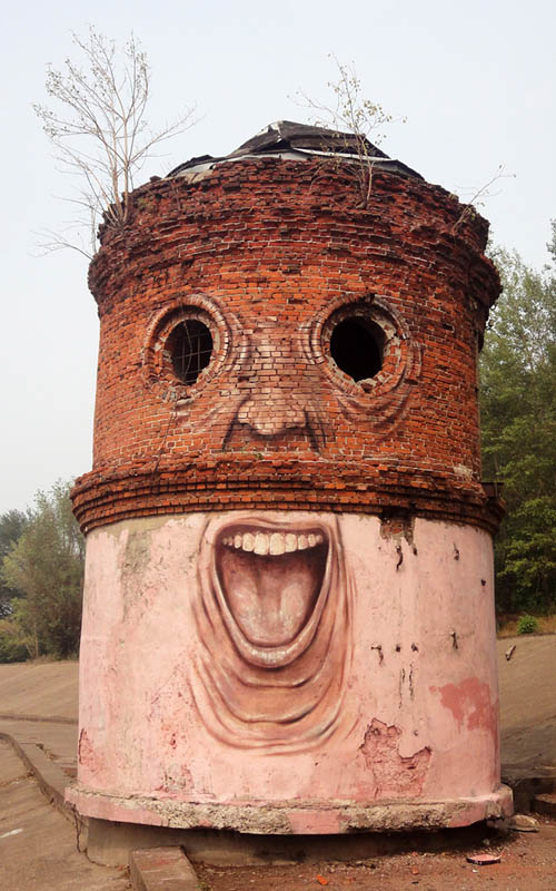 street art nikita nomerz bringing buildings to life 19 Painter Turns Tree Holes into Works of Art