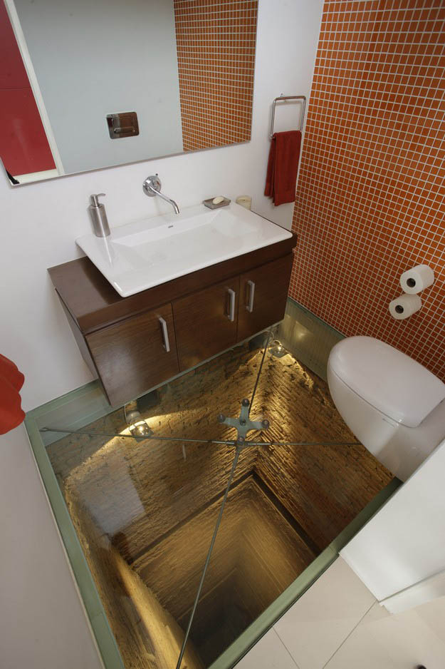 bathroom built over elevator shaft 2 This Bathroom Will Scare the Crap out of You