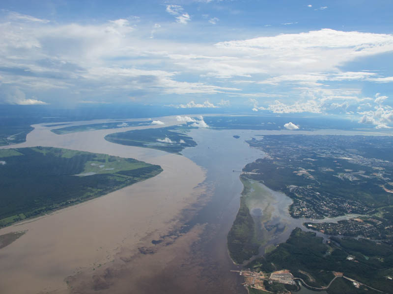 confluence of the rio negro black and the rio solimoes sandy near manaus brazil When Rivers Collide: 10 Confluences Around the World