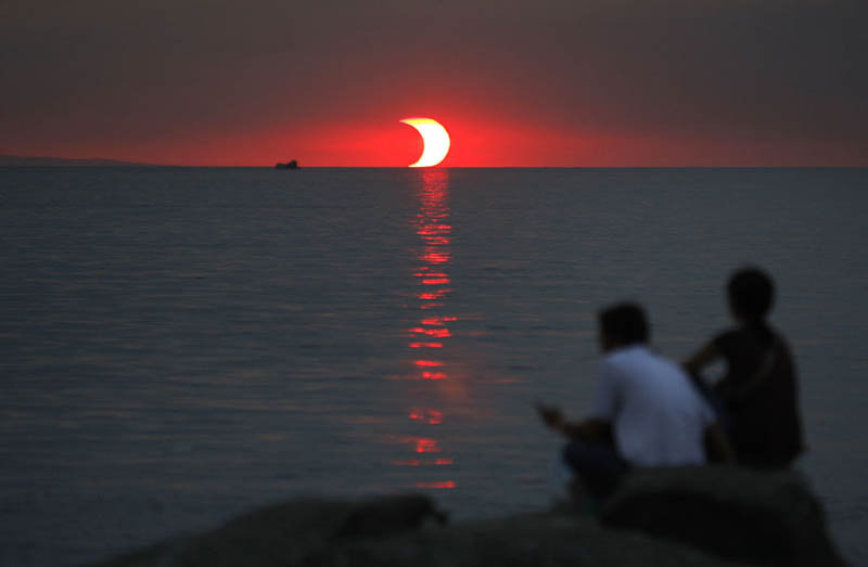 partial solar eclipse at sunset Picture of the Day: A Sunset Eclipse