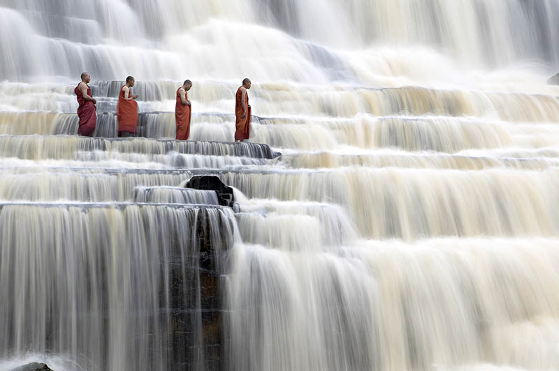 mediating monks on pongour falls vietnam Picture of the Day: Meditating Monks at Pongour Falls