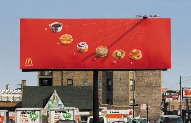 mcdonalds billboard like sundial shows different food for different time of day