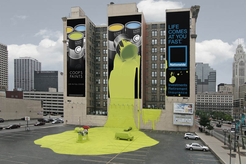 outdoor ad looks like giant bucket of paint spilled onto parking lot ground and made a mess