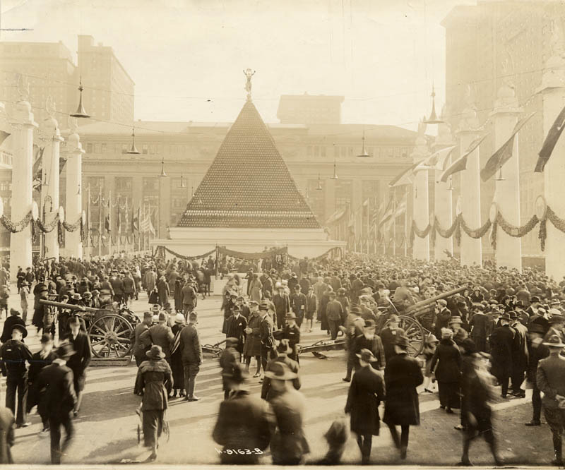 large pyramid of captured german helemts from world war I outside of grand central terminal in new york city 1918