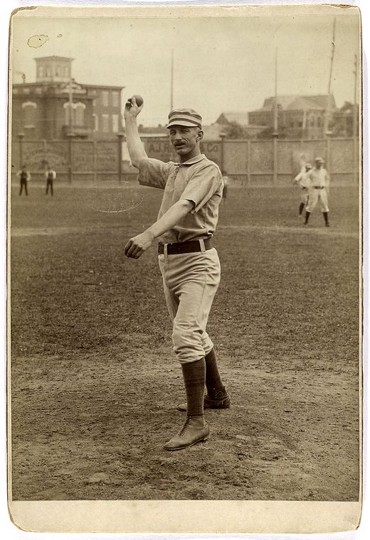 Charlie Buffinton about to pitch a baseball