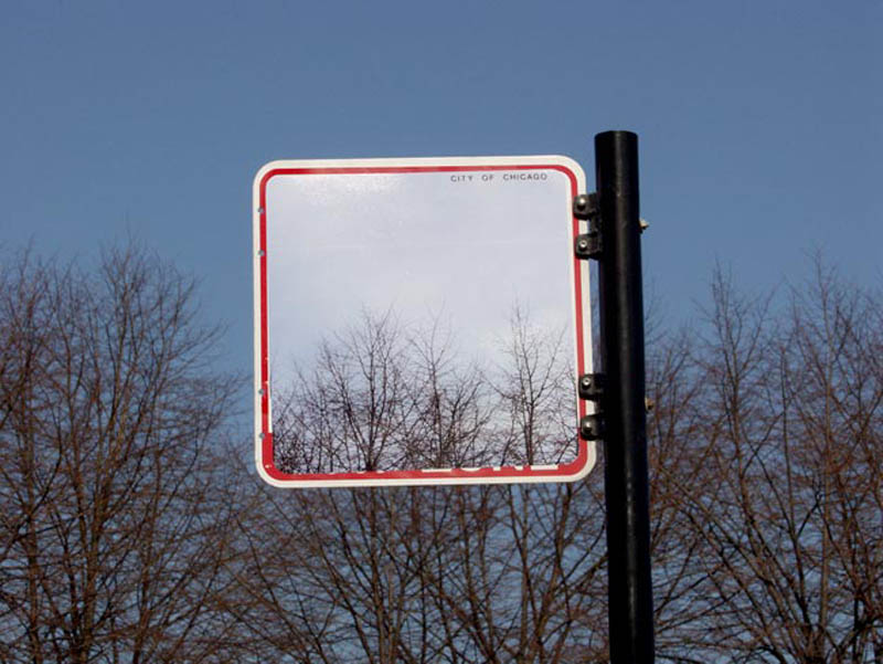 street sign that appears to be transparent but it not