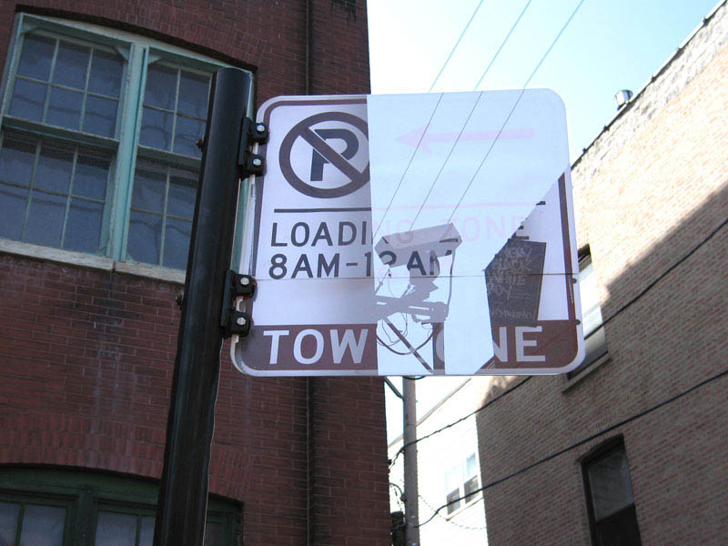 street sign pasted with photo of background so it looks transparent