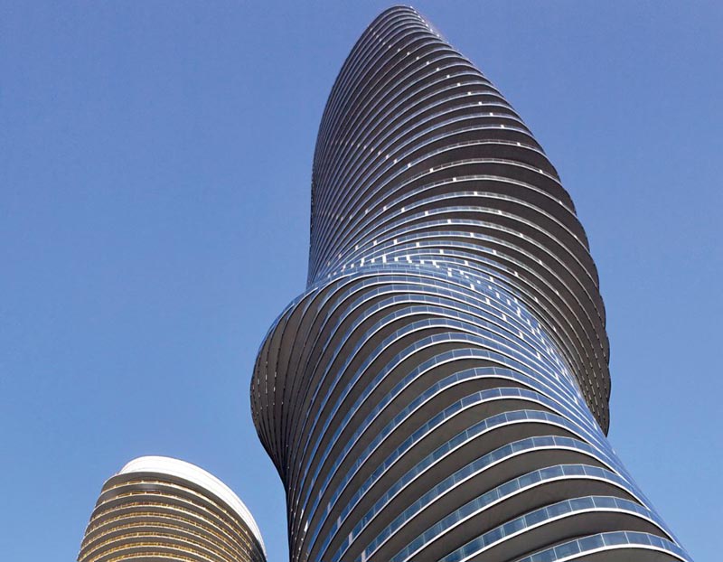 looking skyward at the marilyn monroe absolute condo tower in mississauga canada by mad architects