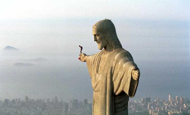 felix baumgartner atop christ the redeemer statue in rio de janeiro brazil before be BASE jumps from the iconic statue