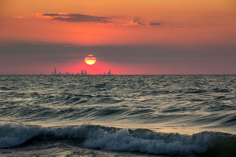 chicago skyline from indiana sunset across water Picture of the Day: The Chicago Skyline from Indiana