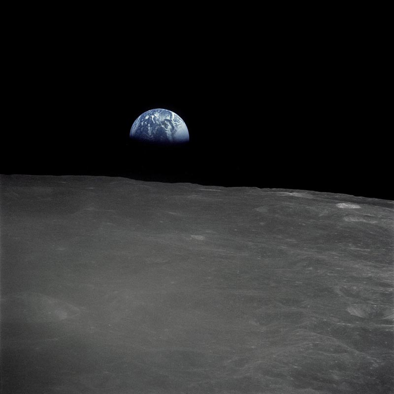 the earth rise as seen from the dark side of the moon
