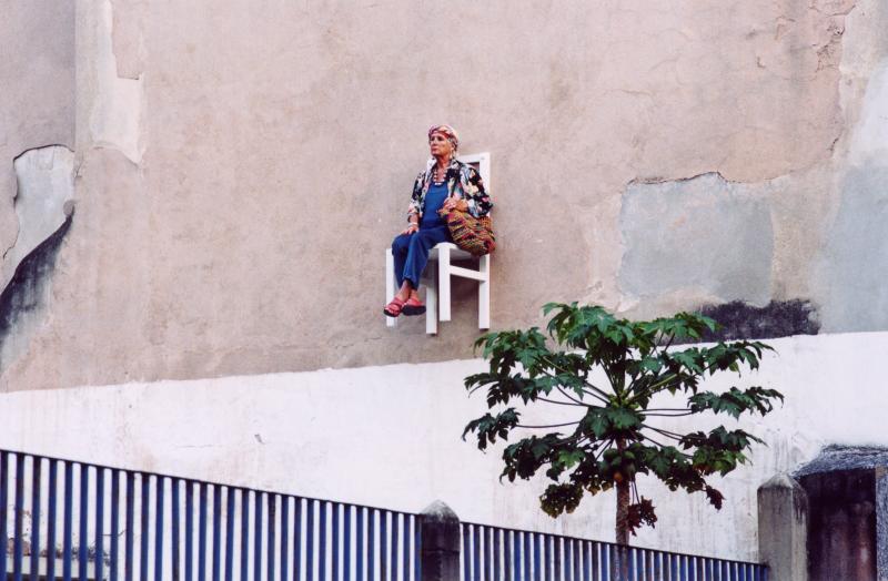 old people sitting in chairs high above ground in montreal angie heisl 6 Elderly People Suspended High Above the Streets of Montreal 