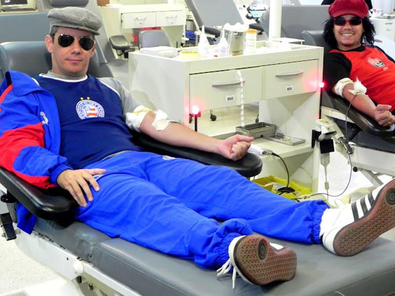 people donating blood to restore jersey red stripes for brazillian football club ec vitoria 1 Football Club Removes Red from Jersey for Blood Donation Campaign