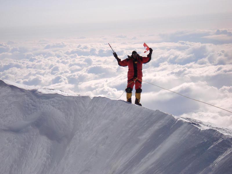 climber reaches the summit of mt mckinley